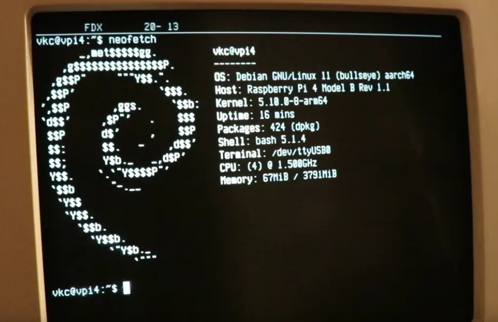 A picture of a Wyse terminal starting up and connecting to a Raspberry Pi. It is showing neofetch, demonstrating that the distribution is Debian.